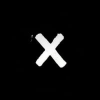 X coin logo